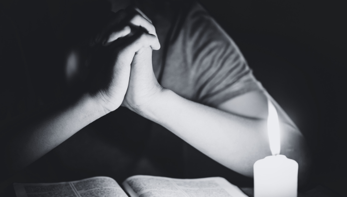 Additional Spiritual Practices to Complement Prayer - a man meditating on his prayer