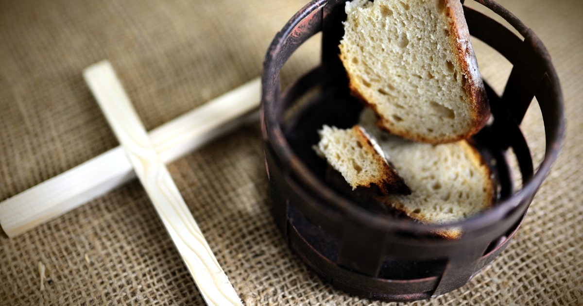 Christian fasting - a cross and bread in a container