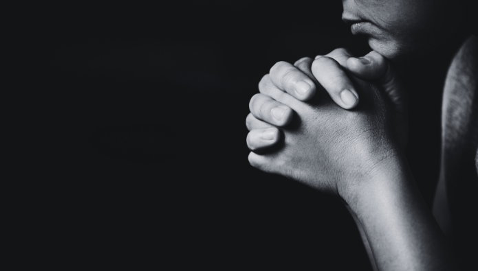 Coping with Unanswered Prayers - a prayer for the sick - a woman praying